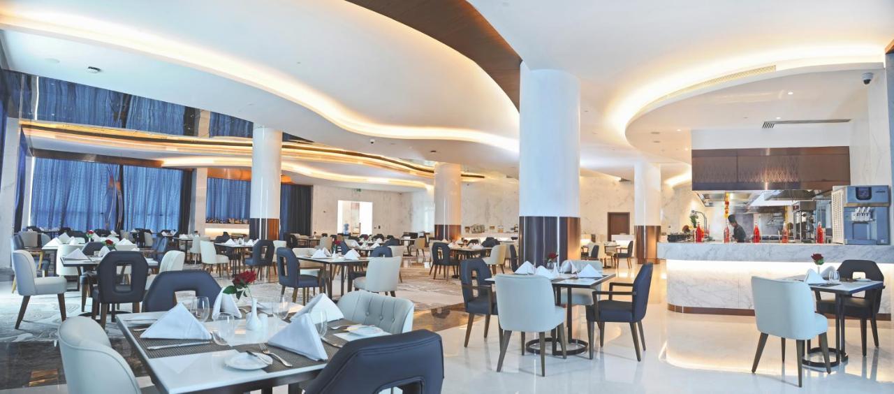 Royal M Al Aqah Beach Resort By Gewan Exterior foto The restaurant